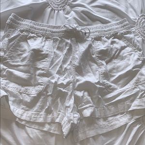 white loose fitting flowy shorts